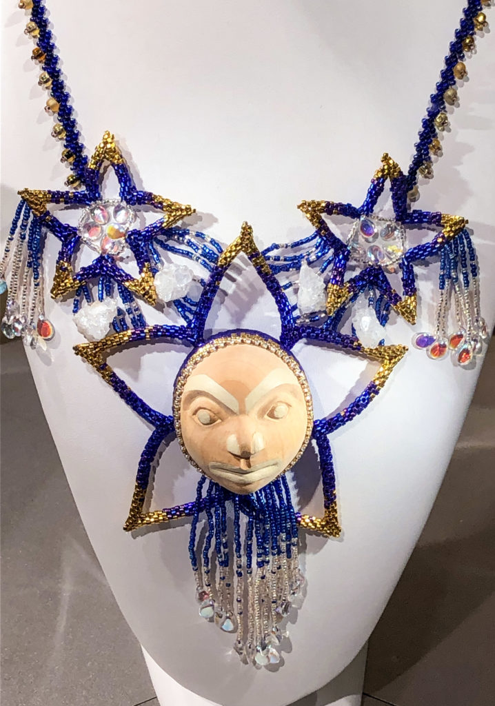 Alison Marks, <em>Mother</em>, 2019. Alder, acrylic paint, glass beads, 24k gold plated beads, druzy crystals. Courtesy the Bill Reid Gallery.