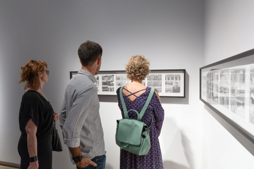 Visitors consider Diane Obomsawin's work at the opening of the exhibition “Sex Life: Homoeroticism in Drawing,” during the launch of the new SAW Gallery. Photo: Justin Wonnacott / SAW.