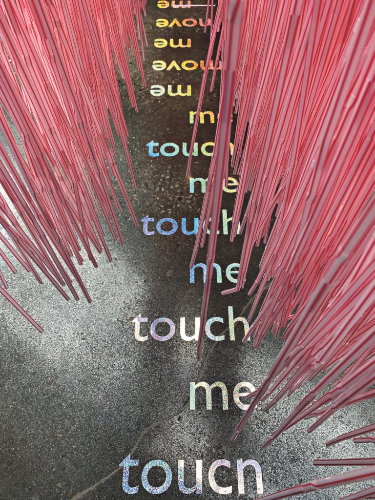 jes sachse, <em>Freedom Tube</em> (detail), 2019. Installation with straws, text and vinyl at the Small Arms Inspection Building. Courtesy the artist.