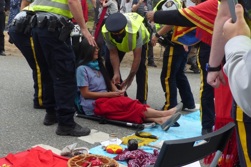 Rita Wong while being arrested at a Trans Mountain Pipeline protest in Burnaby in August 2018. Photo: GoFundMe. 
