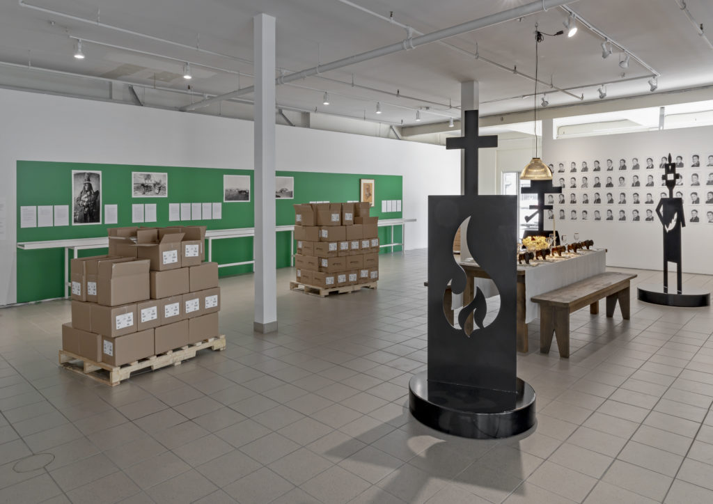 AA Bronson, <em>A Public Apology to Siksika Nation</em>, 2019, a multi-media project with publication, installation and
performative components in several stages; Adrian Stimson, <em>Iini Sookumapii: Guess who’s coming to dinner?</em>. Commissioned by the Toronto Biennial of Art, 2019. Photo: Toni Hafkenscheid. Courtesy the Toronto Biennial of Art.