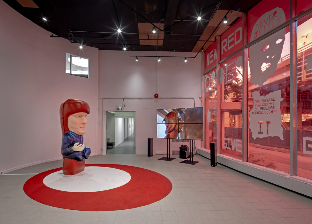 The New Red Order (NRO), <em>Never Settle</em>, 2019. Mixed-media installation. Courtesy Toronto Biennial of Art. Photo: Toni Hafkenscheid.