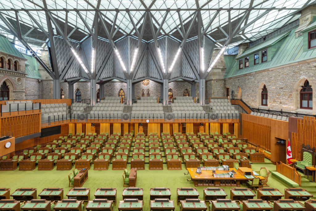A view of the recently renovated House of Commons in Ottawa, where an 1866 gothic structure has been provided with a new, modern glass roof. Modernized architecture by Arcop and Fournier Gersovitz Moss Drolet et Associés. Photo: Facebook / Parliament of Canada.