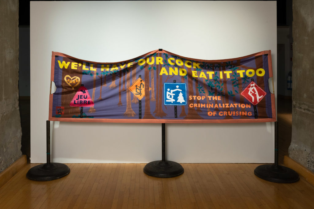 David Widgington, <em>We'll Have Our Cock and Eat it Too</em> 2019. Paint on fabric, bamboo. Installation view of "69 Positions: Porter témoignage | Our Vanishing," exhibition at Montreal, arts interculturels. Photo: Paul Litherland