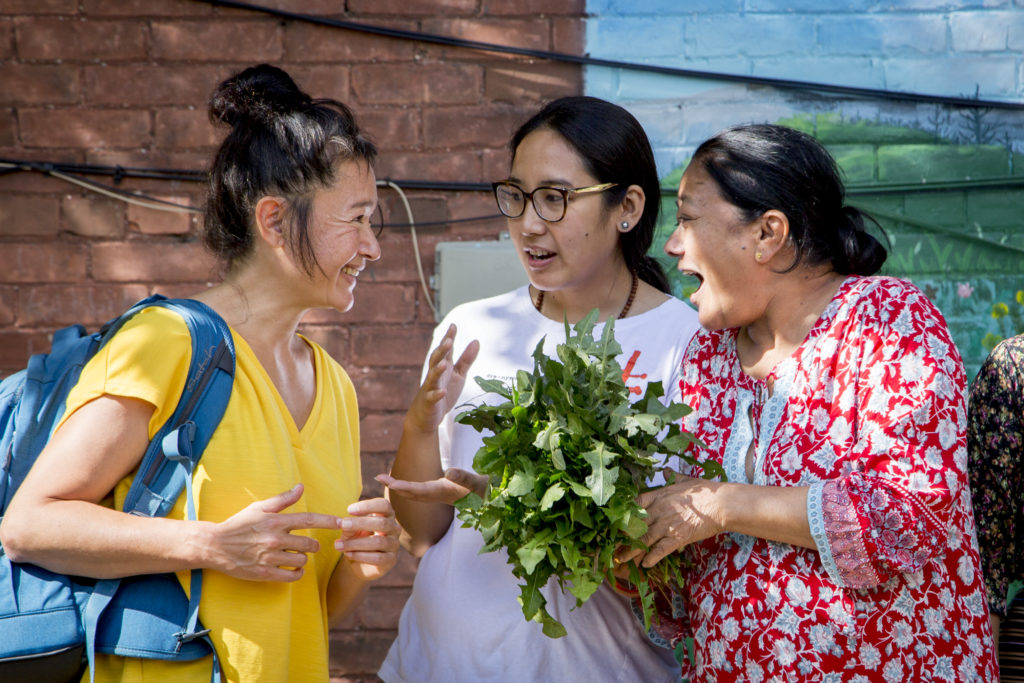 Hito Steyerl at the Milky Way Community Garden in Toronto. From left to right: Hito Steyerl, Tenzin Tsundue and Sova Lama. Photo courtesy the AGO.