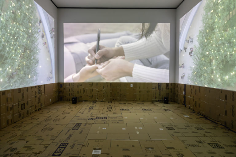Stephanie Comilang, <em>Lumapit Sa Akin, Paraiso (Come To Me, Paradise)</em> (still), 2016. Video, 26 min. Installation view at the Art Gallery of Alberta. Photo Leroy Schultz