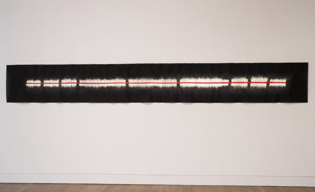 Maureen Gruben, <em>Message</em>, 2015. Polar bear guard hair, cotton thread, black interface. Collection of the Artist. Photo: Ming Wu. 