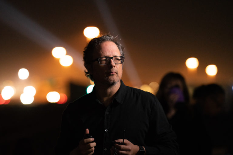 Rafael Lozano-Hemmer at <em>Border Tuner</em>, 2019. Photo: Monica Lozano. 