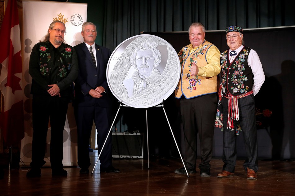From left: Artist David Garneau, Royal Canadian Mint Senior Director of Manufacturing Tom Roche, Manitoba Metis Federation President David Chartrand and Métis National Council President Clement Chartier unveil a silver collector coin celebrating the 175th anniversary of the birth of Louis Riel in Winnipeg, Manitoba on October 22, 2019. Courtesy CNW Group/Royal Canadian Mint.
