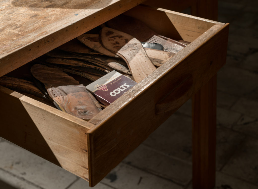 Vicky Sabourin‘s “Colts raisin” (installation detail), 2019. Materials include found used women‘s shoe insoles and an old pack of Colts grape cigars; the cigars were stolen during the exhibition. Photo: Clara Lacasse. Courtesy the artist.