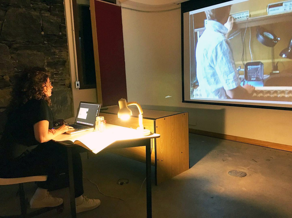 Veronica Simmonds reviewing footage from the archives of Centre For Art Tapes. Courtesy CFAT.