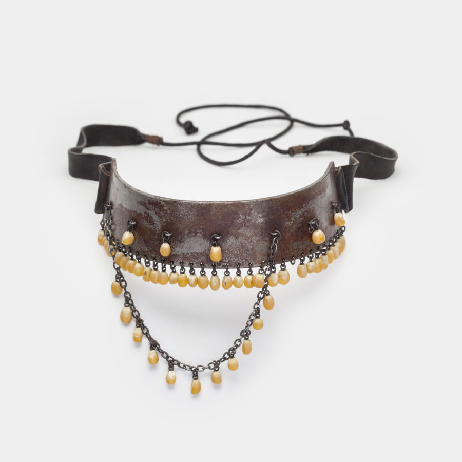 Karin Jones, Yoke, 2017 (detail). Steel, corn, sterling silver, brass, leather, handmade brass mount on wood panel. 61 cm x 122 cm x 30.5 cm. Photo credit: Anthony McLean.
