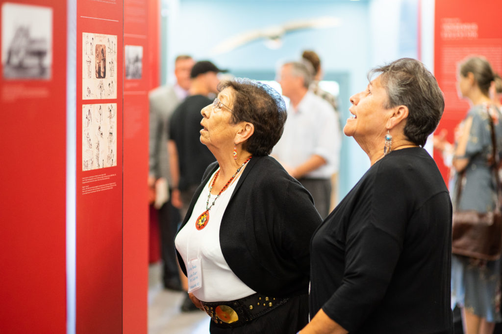 Visitors take in an exhibition at the Shingwauk Residential Schools Centre. Photo: SRSC.
