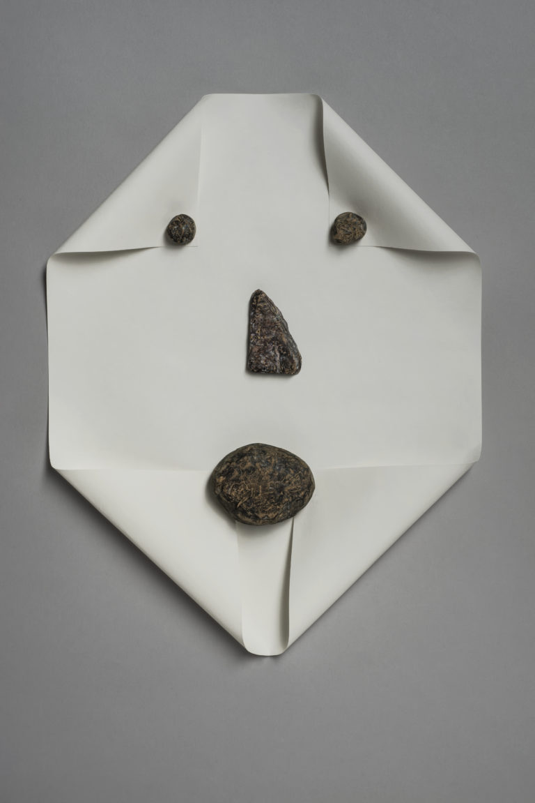 Michael Dumontier, <em>Untitled (rocks and paper) (face)</em>, 2014. Paper, glue, mdf, colored pencil. Courtesy the artist and MKG127.