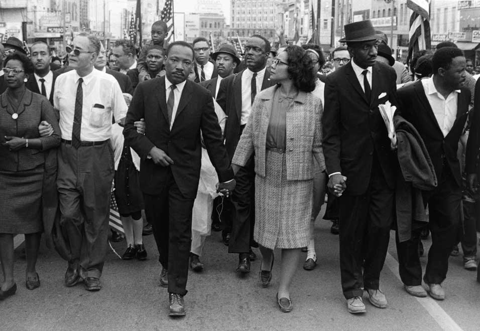 March To Montgomery. Dr. Martin Luther King, Jr. arrives in Montgomery, Alabama on March 25,
1965, at the culmination of the Selma to Montgomery March. Pictured, from
left: Ralph Bunche, Dr. Martin Luther King, Jr., Coretta Scott King,
Rev. Fred Shuttlesworth, Hosea Williams. Photo: Morton Broffman/Getty
Images