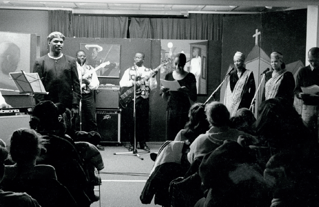 David Woods performing with Voices Black Theatre Ensemble at Halifax Public Libraries Black History Month event in 1998. Courtesy Cultural Awareness Youth Group Archive. 