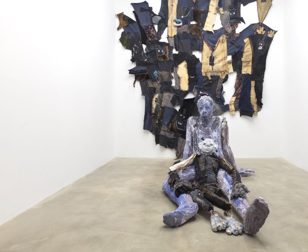 Installation view of Tau Lewis’s (from centre, front) <em>Seashell</em>, <em>What in the water? (time capsule #3)</em> and <em>Making it work to be
together while we can</em> (all 2018). Courtesy Cooper Cole. 