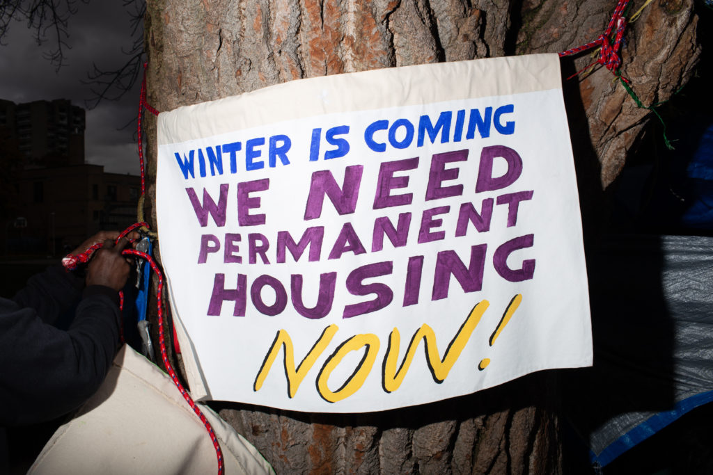 Jeff Bierk, <em>Winter Is Coming, We Need Permanent Housing Now!, with ESN, for AK and Family, Moss Park, South Side, October 21, 2020</em>, 2020. Photograph.
