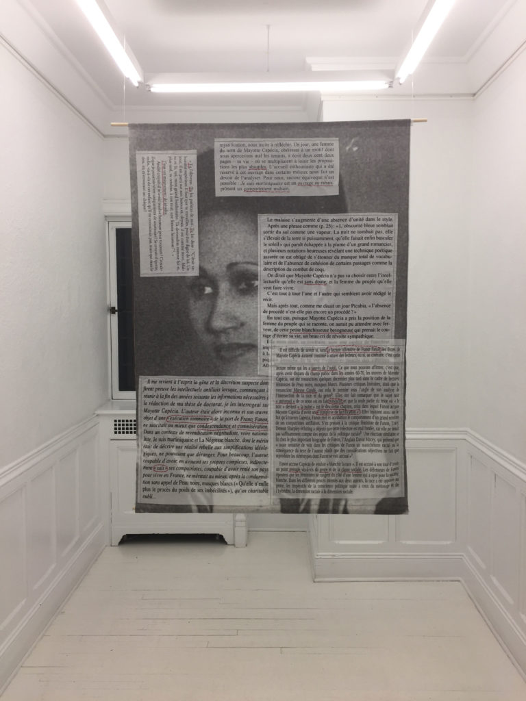 Michaëlle Sergile, <em>De Capécia à Fanon (From Capécia to Fanon)</em>, 2020. Cotton fabric, acrylic threads and wooden supports, 1.2 m x 76.2 cm.