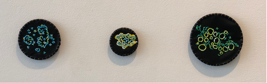 Zoë Laycock, <em>Growth On The Forever Road...</em>, 2019. Glass Czech seed beads, black lambskin leather stretched over brass hoops, 11 x 45 cm.