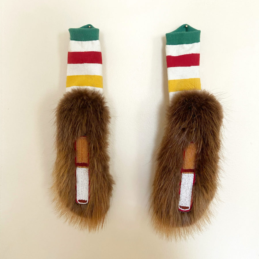 Audie Murray, a pair of socks: cigarettes & fur, 2020.